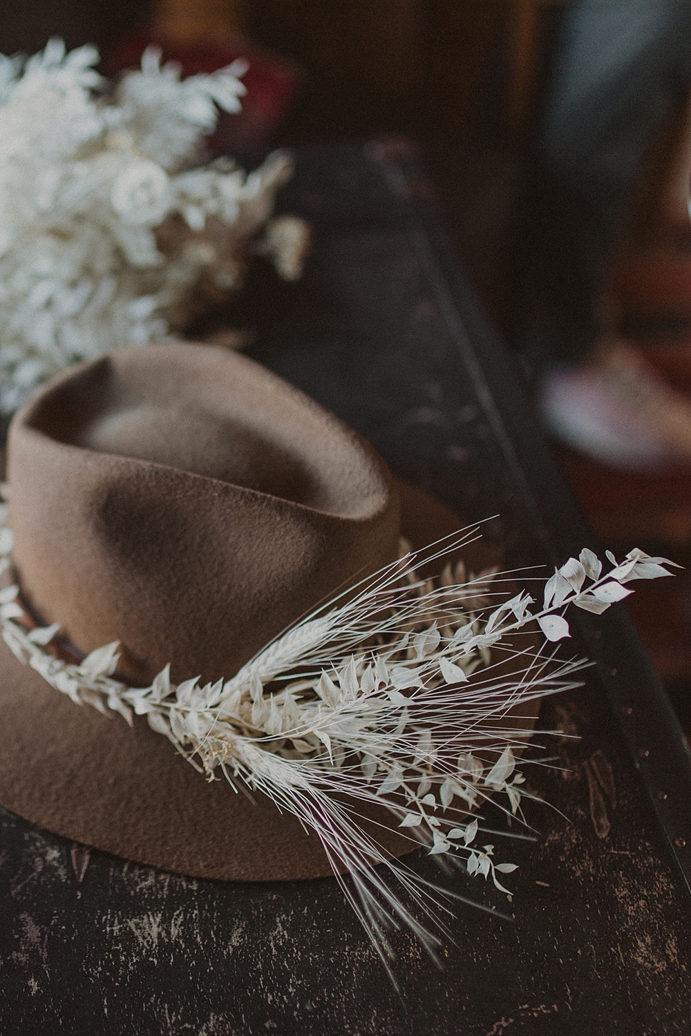 Hat with floral details for desert elopement. 
