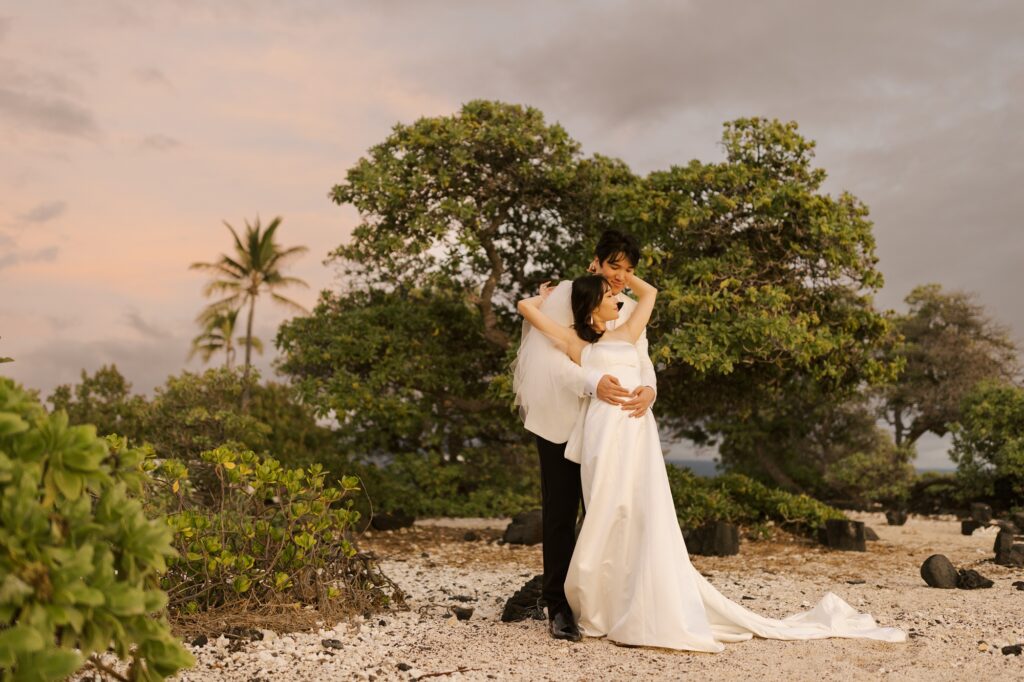 Couple at Kohanaiki, in Kona, Hawaii for their wedding photo. 